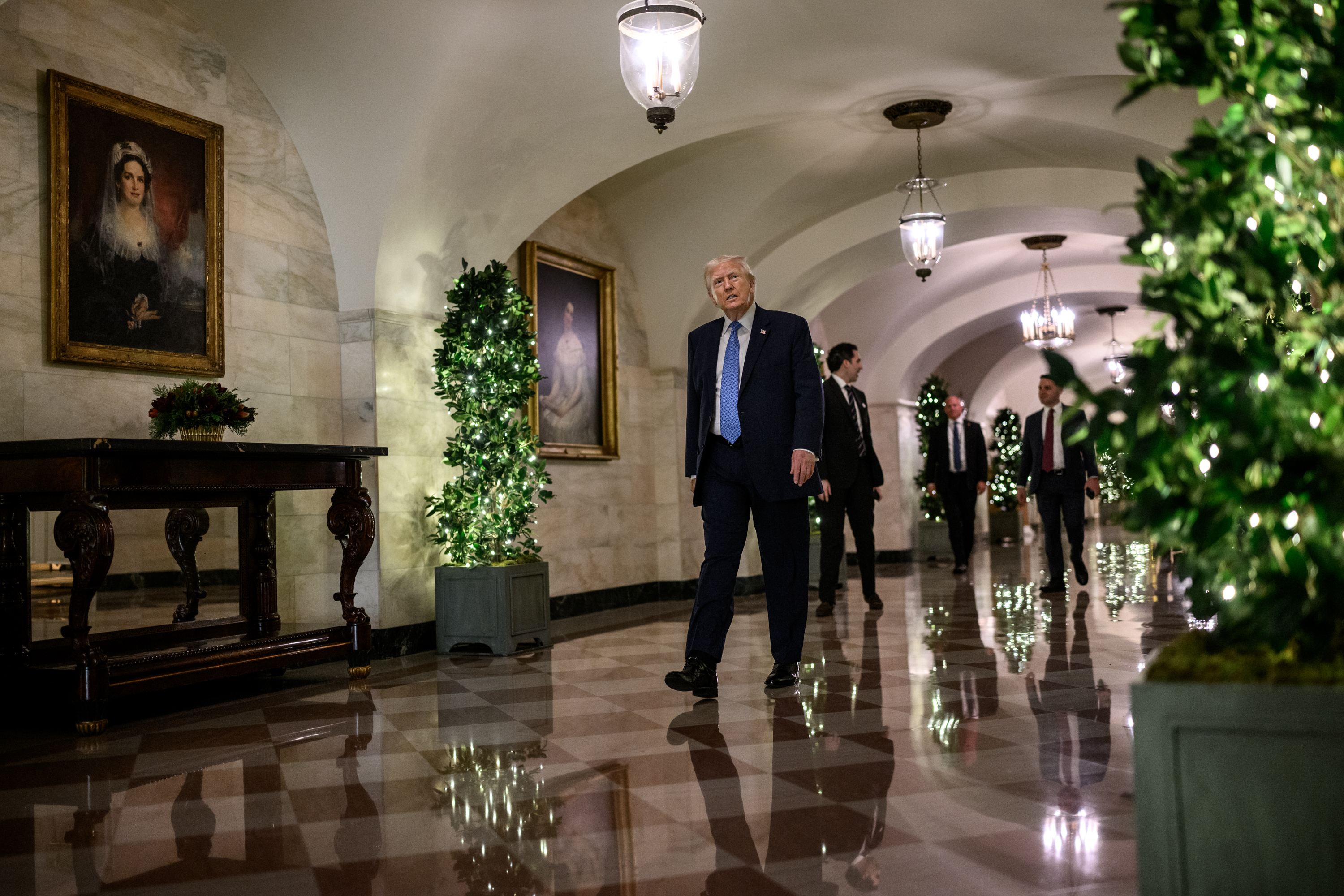 President Donald Trump delivers remarks to staff during a Christmas ...