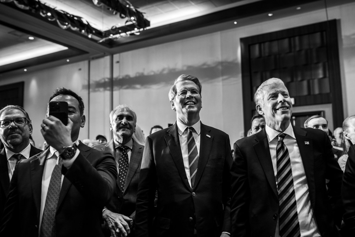 Secretary of the Treasury Scott Bessent and Secretary of Energy Chris Wright listen to President Donald Trump deliver remarks on the economy at Mount Airy Casino Resort in Mount Pocono, Pennsylvania, Tuesday, December 9, 2025. (Official White House Photo by Molly Riley)