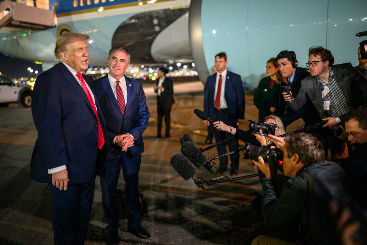 President Donald Trump speaks to press before boarding Air Force One at Miami International Airport in Miami, Florida on Monday, January 19, 2026, en route to Joint Base Andrews, Maryland. (Official White House Photo by Daniel Torok)
