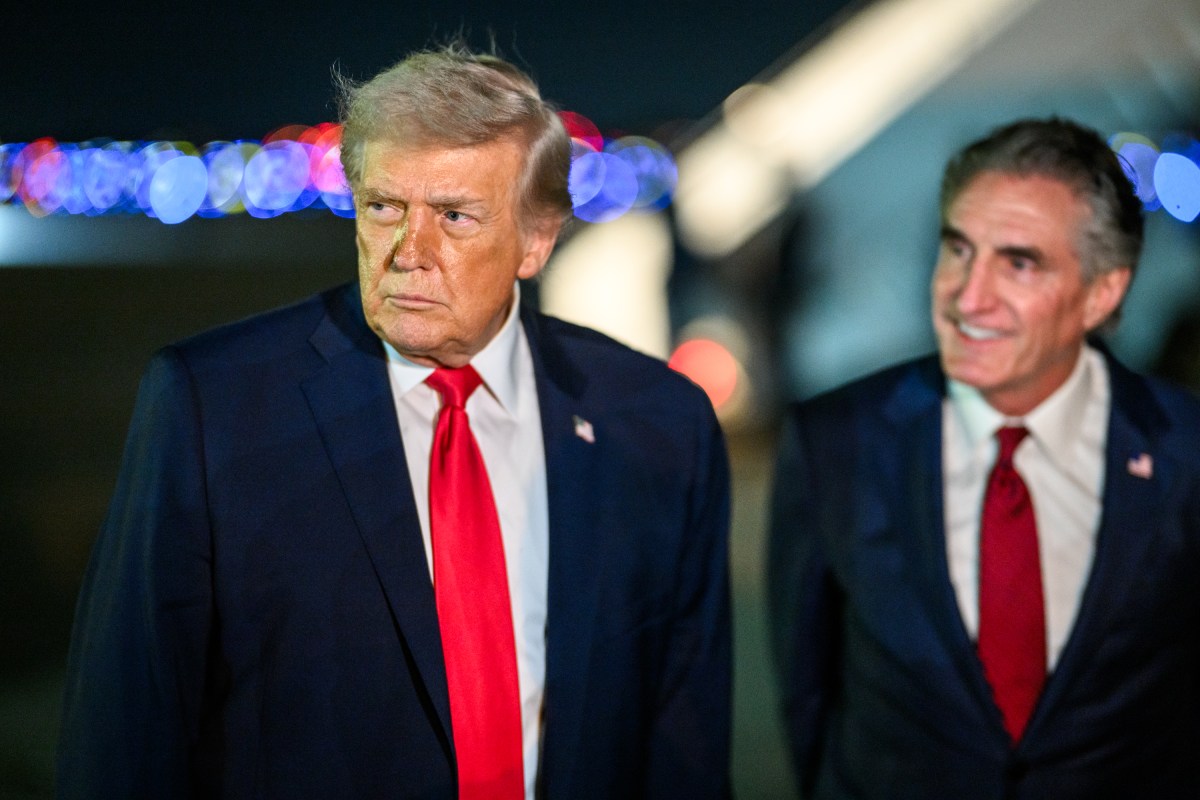 President Donald Trump speaks to press before boarding Air Force One at Miami International Airport in Miami, Florida on Monday, January 19, 2026, en route to Joint Base Andrews, Maryland. (Official White House Photo by Daniel Torok)