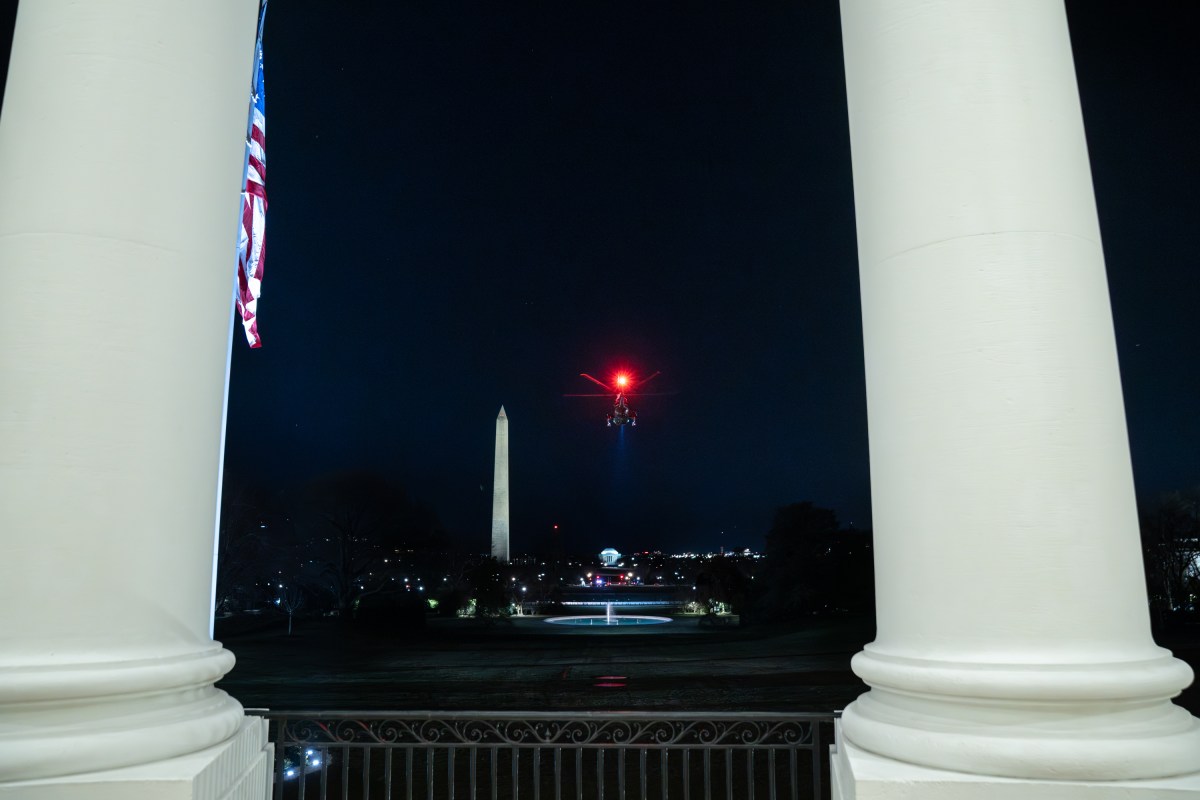 President Donald Trump boards Marine One on the South Lawn of the White House, Tuesday, January 20, 2026, en route to Joint Base Andrews, Maryland for his trip to the World Economic Forum in Davos, Switzerland. (Official White House Photo by Patrick B. Ruddy)