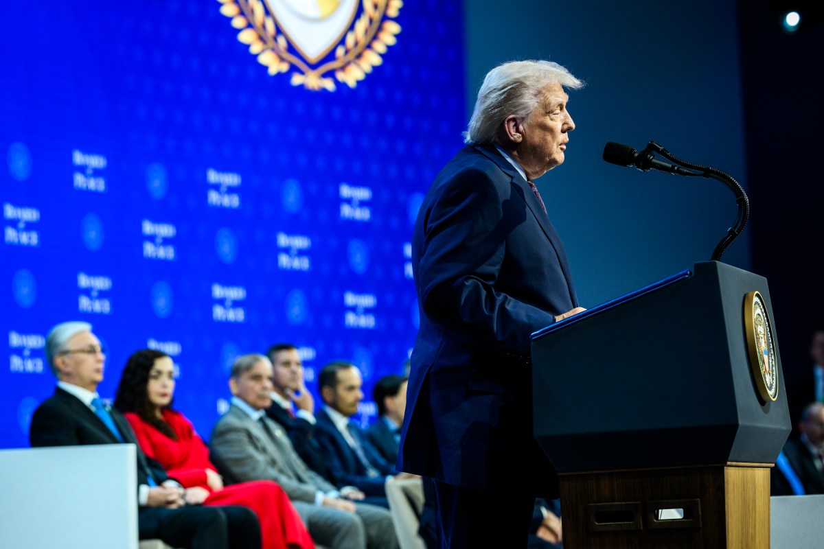 President Donald Trump participates in the Board of Peace Charter Announcement and Signing ceremony during the World Economic Forum, Thursday, January 22, 2026, at the Davos Congress Center in Davos, Switzerland. (Official White House Photo by Daniel Torok)