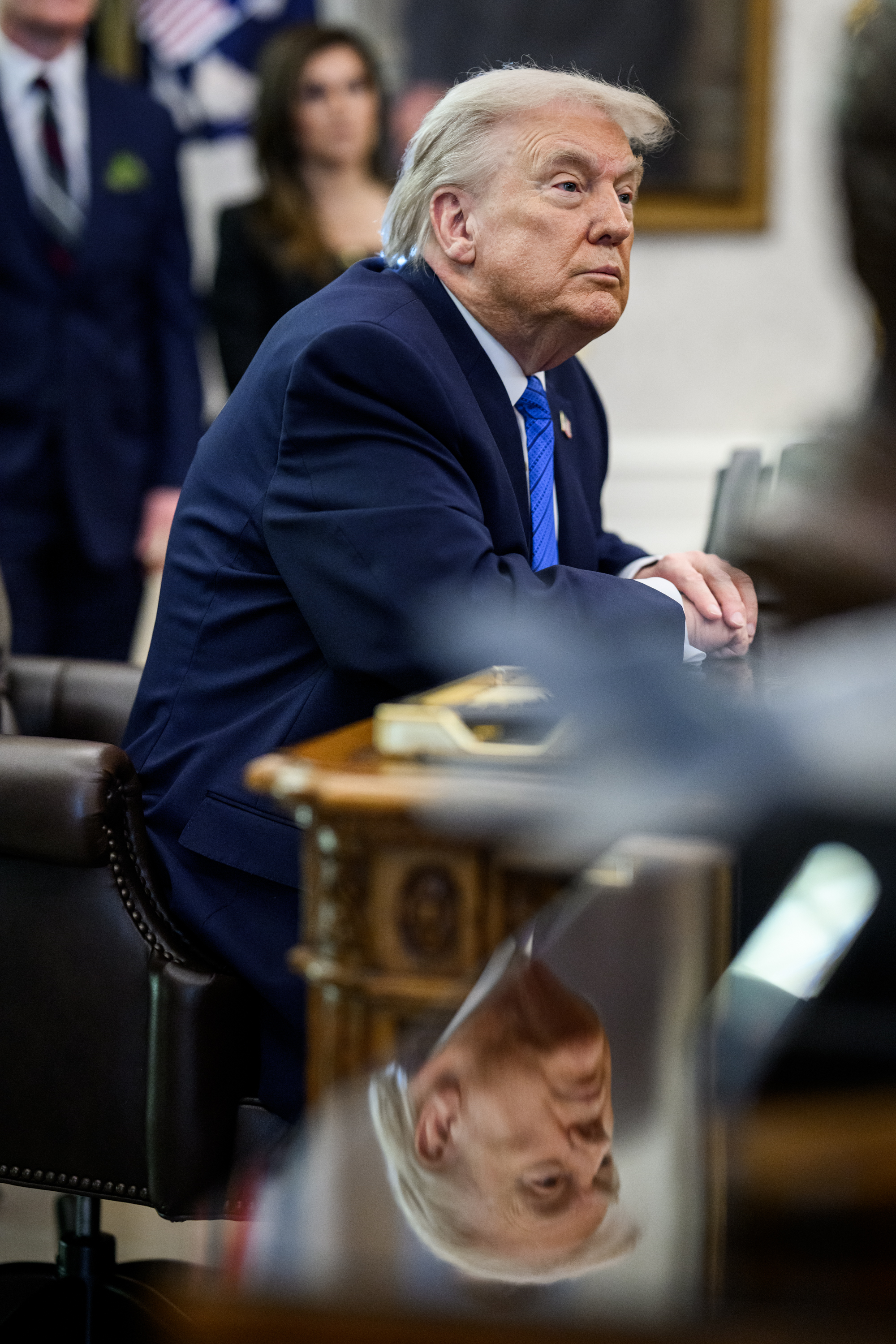President Donald Trump signs an executive order bringing IndyCar