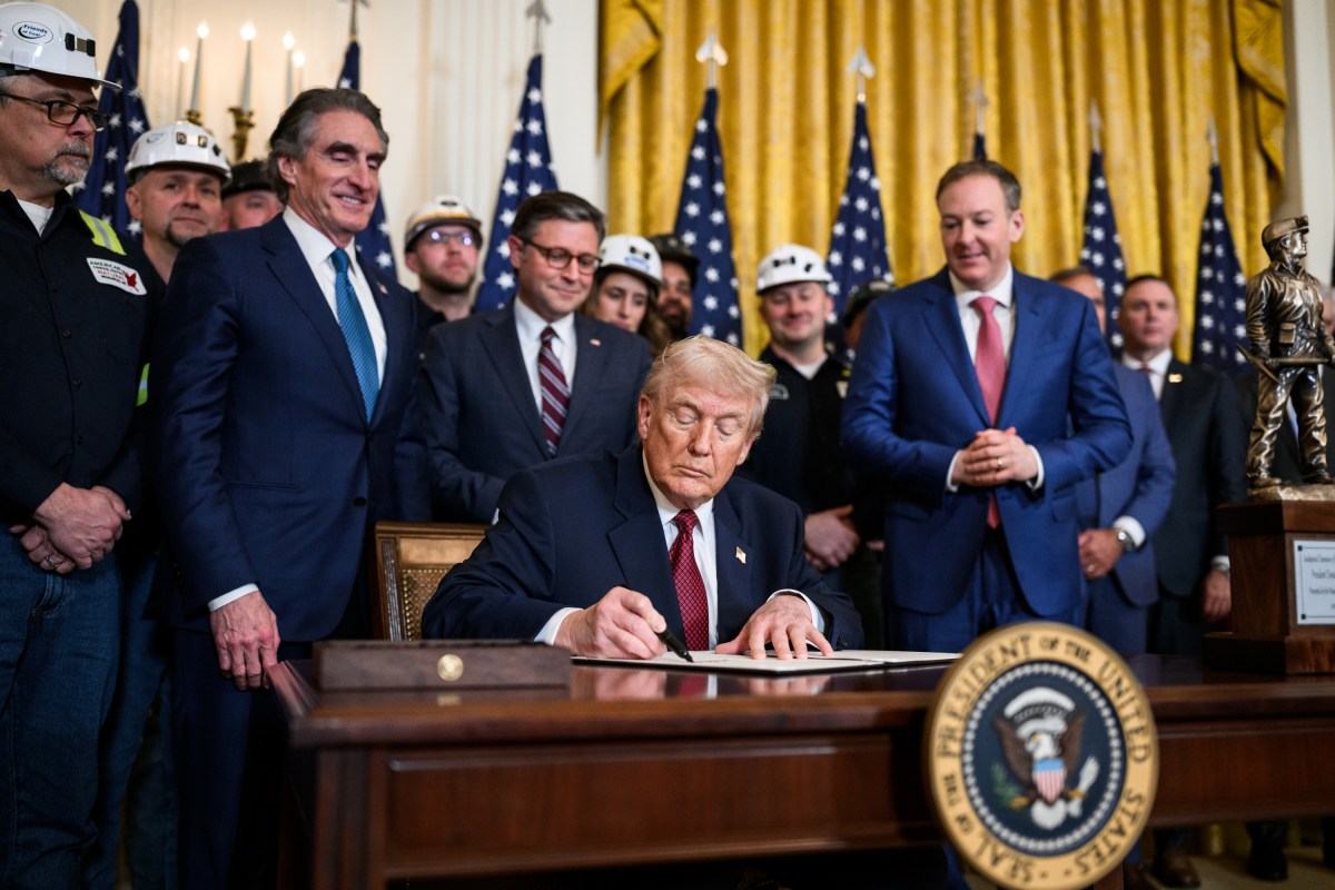 President Donald Trump signs an Executive Order at a Champion of Coal event in the East Room of the White House, Wednesday, February 11, 2026. (Official White House Photo by Molly Riley)
