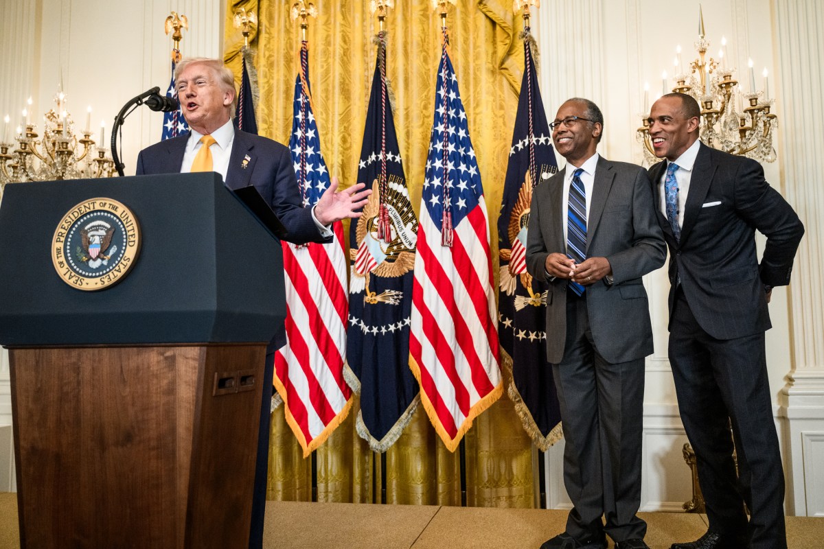 President Donald Trump delivers remarks alongside Ben Carson and Secretary of Housing and Urban Development Scott Turner at a Black History Month reception, Wednesday, February 18, 2026, in the East Room of the White House. (Official White House Photo by Joyce N. Boghosian)