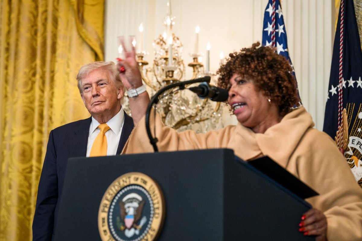 President Donald Trump looks on as Felicia Cook delivers remarks at a Black History Month reception, Wednesday, February 18, 2026, in the East Room of the White House. (Official White House Photo by Joyce N. Boghosian)