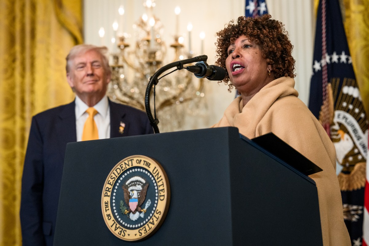 President Donald Trump looks on as Felicia Cook delivers remarks at a Black History Month reception, Wednesday, February 18, 2026, in the East Room of the White House. (Official White House Photo by Joyce N. Boghosian)