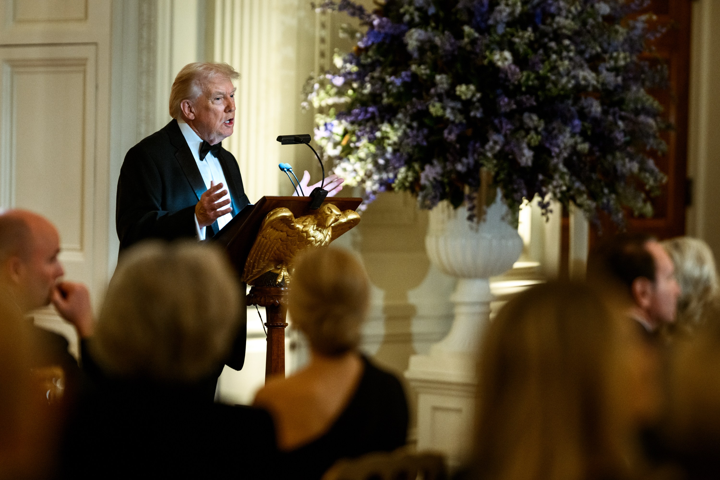 President Donald Trump delivers remarks at a dinner for the nation’s ...