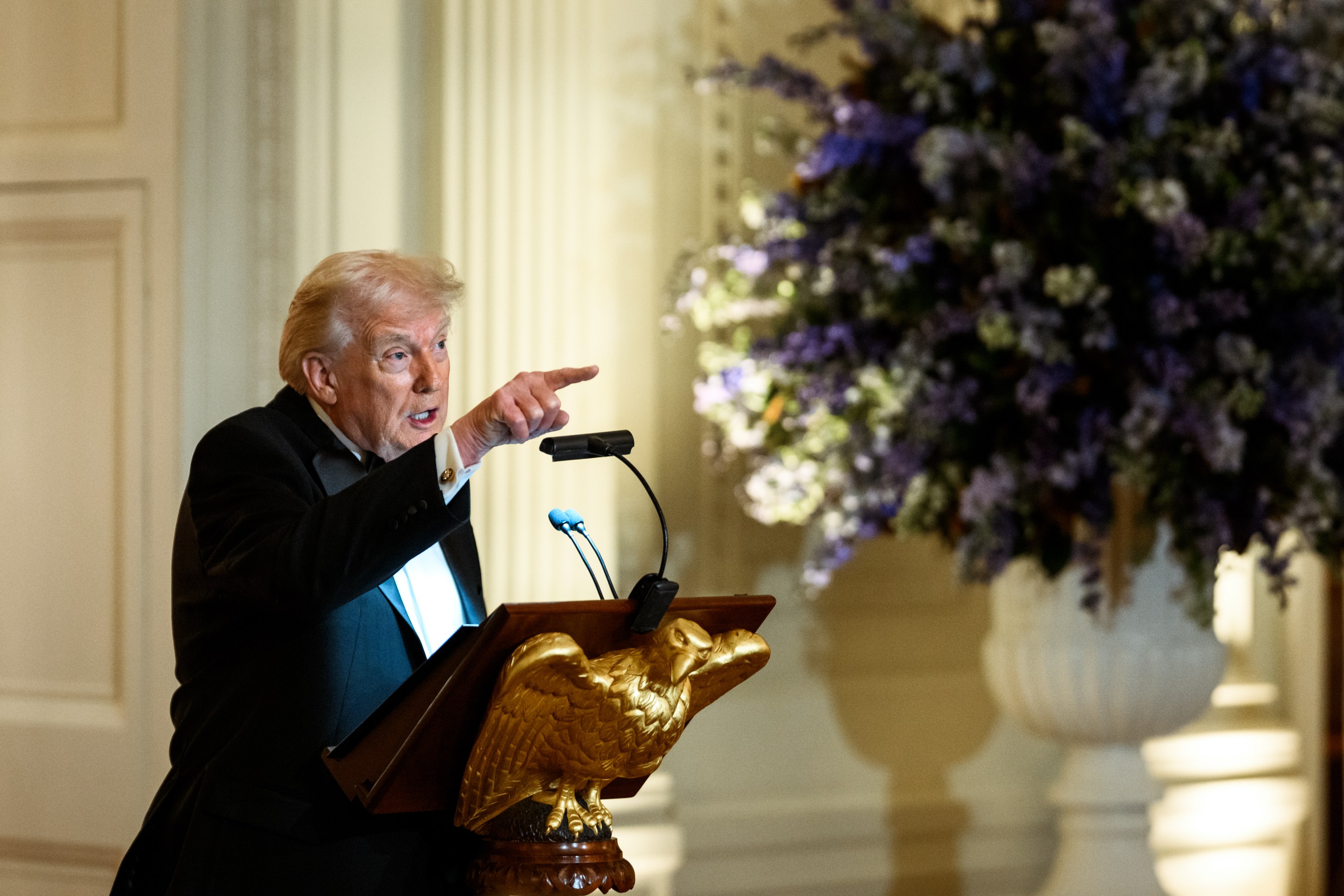 President Donald Trump delivers remarks at a dinner for the nation’s ...