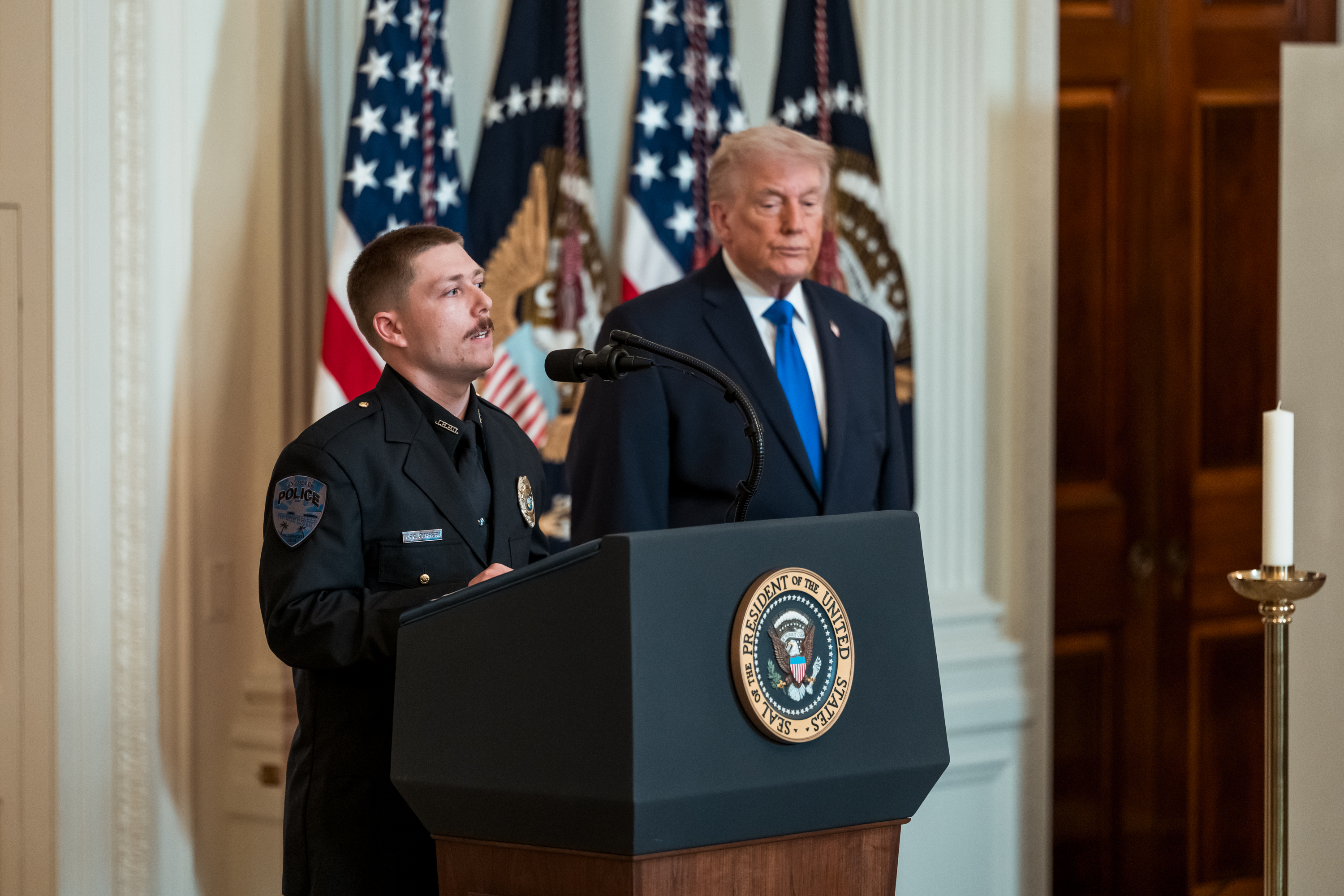 Officer Ethan Curreri delivers remarks at an Angel Families Remembrance Ceremony, Monday, February 23, 2026, in the East Room of the White House. (Official White House Photo by Abe McNatt)