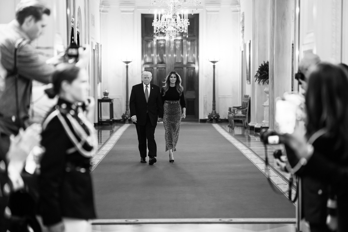 President Donald J. Trump and First Lady Melania Trump walk through the Cross Hall to the East Room for an event celebrating Women’s History Month and National Working Mom’s Day, Thursday, March 12, 2026. (Official White House Photo by Andrea Hanks)