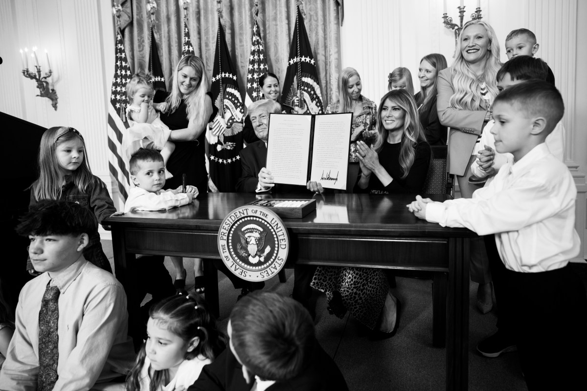President Donald J. Trump, joined by First Lady Melania Trump, signs a proclamation at an event celebrating Women’s History Month and National Working Mom’s Day, Thursday, March 12, 2026, in the East Room of the White House. (Official White House Photo by Andrea Hanks)