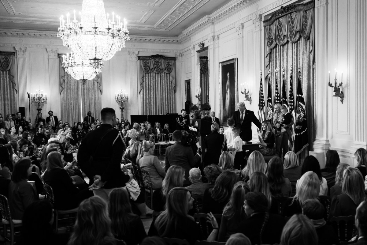 President Donald J. Trump, joined by First Lady Melania Trump, signs a proclamation at an event celebrating Women’s History Month and National Working Mom’s Day, Thursday, March 12, 2026, in the East Room of the White House. (Official White House Photo by Cody Hendrix)