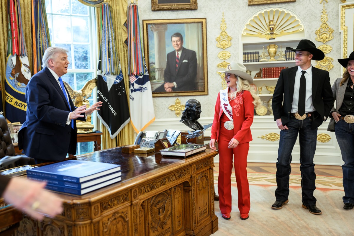 President Donald J. Trump greets National Finals Rodeo winners in the Oval Office, Friday, March 13, 2026. (Official White House Photo by Molly Riley)