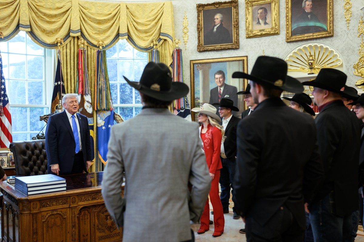 President Donald J. Trump greets National Finals Rodeo winners in the Oval Office, Friday, March 13, 2026. (Official White House Photo by Molly Riley)