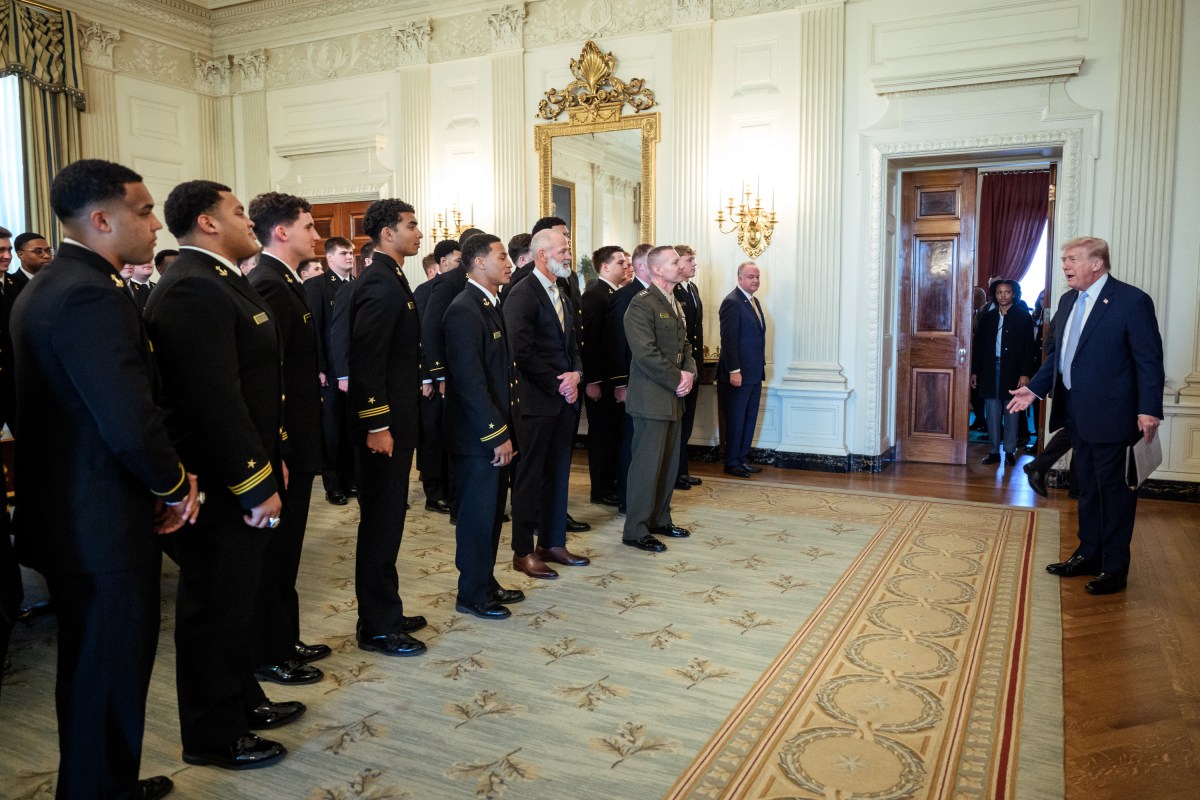 President Donald J. Trump greets the U.S. Naval Academy’s Navy Midshipmen football team in the State Dining Room before a Commander in Chief Trophy presentation, Friday, March 20, 2026. (Official White House Photo by Joyce N. Boghosian)