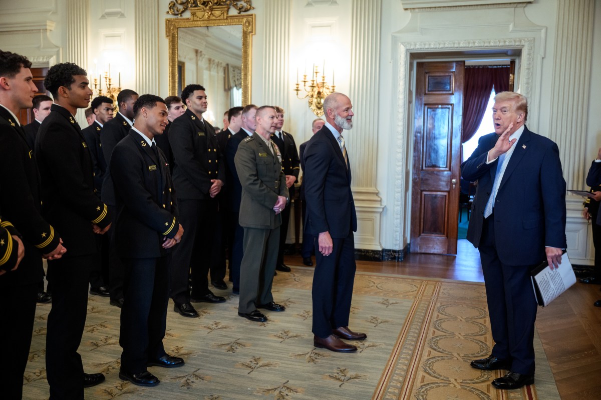 President Donald J. Trump greets the U.S. Naval Academy’s Navy Midshipmen football team in the State Dining Room before a Commander in Chief Trophy presentation, Friday, March 20, 2026. (Official White House Photo by Joyce N. Boghosian)