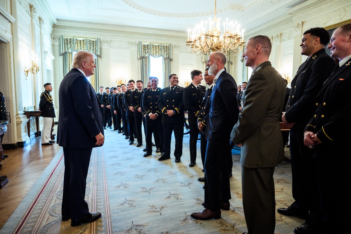 President Donald J. Trump greets the U.S. Naval Academy’s Navy Midshipmen football team in the State Dining Room before a Commander in Chief Trophy presentation, Friday, March 20, 2026. (Official White House Photo by Joyce N. Boghosian)