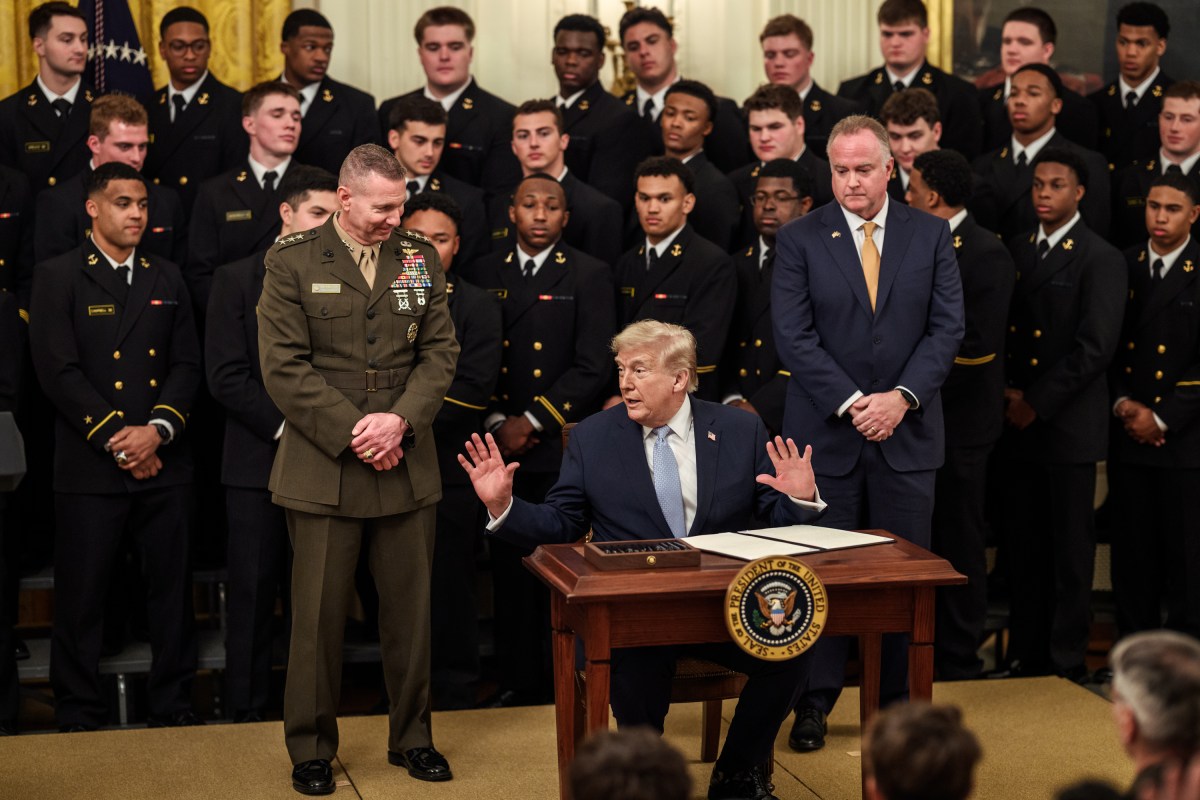 President Donald J. Trump signs an Executive Order during a Commander in Chief Trophy presentation for the U.S. Naval Academy’s Navy Midshipmen football team, Friday, March 20, 2026, in the East Room of the White House. (Official White House Photo by Joyce N. Boghosian)