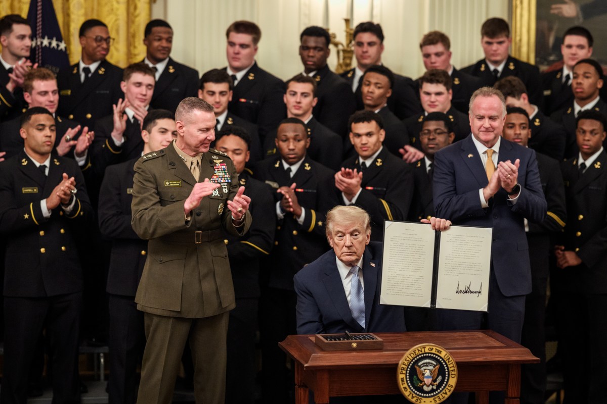 President Donald J. Trump signs an Executive Order during a Commander in Chief Trophy presentation for the U.S. Naval Academy’s Navy Midshipmen football team, Friday, March 20, 2026, in the East Room of the White House. (Official White House Photo by Joyce N. Boghosian)