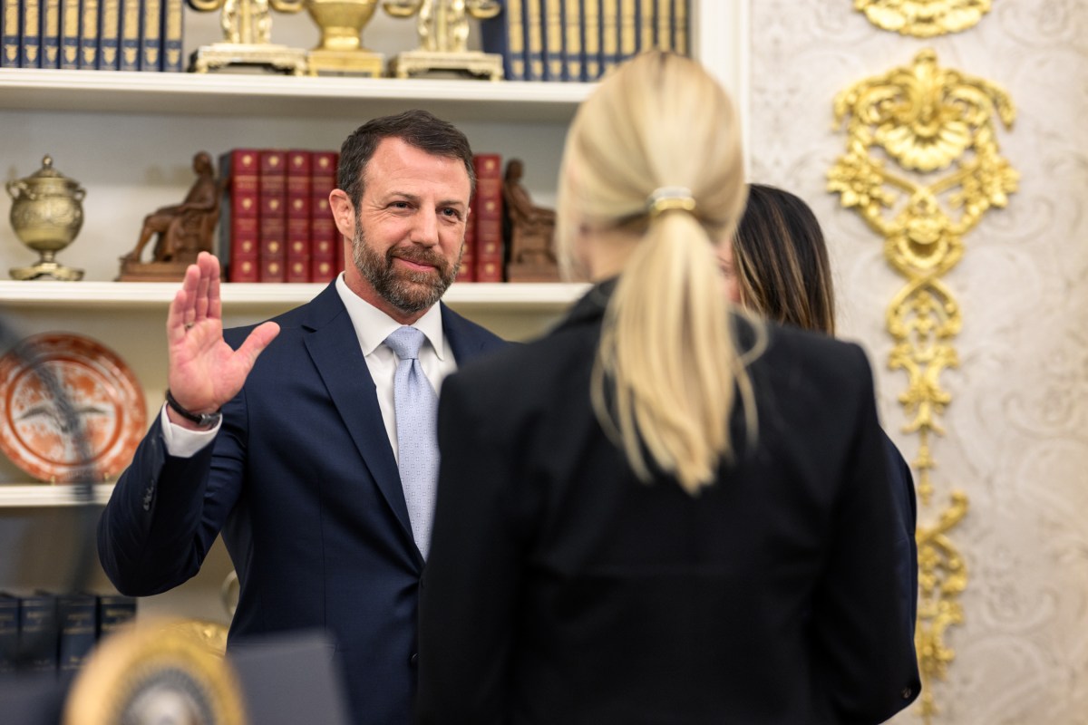 President Donald J. Trump looks on as Attorney General Pam Bondi swears in Markwayne Mullin as Secretary of Homeland Security, Tuesday, March 24, 2026, in the Oval Office. (Official White House photo by Daniel Torok)
