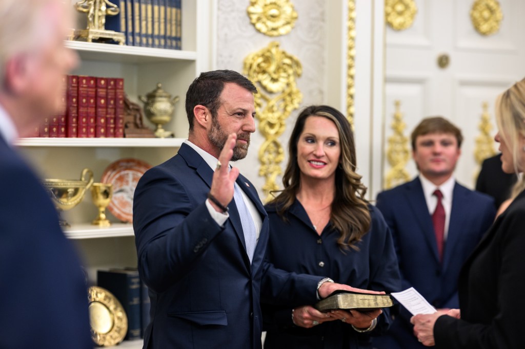 President Donald J. Trump looks on as Attorney General Pam Bondi swears in Markwayne Mullin as Secretary of Homeland Security, Tuesday, March 24, 2026, in the Oval Office. (Official White House photo by Daniel Torok)
