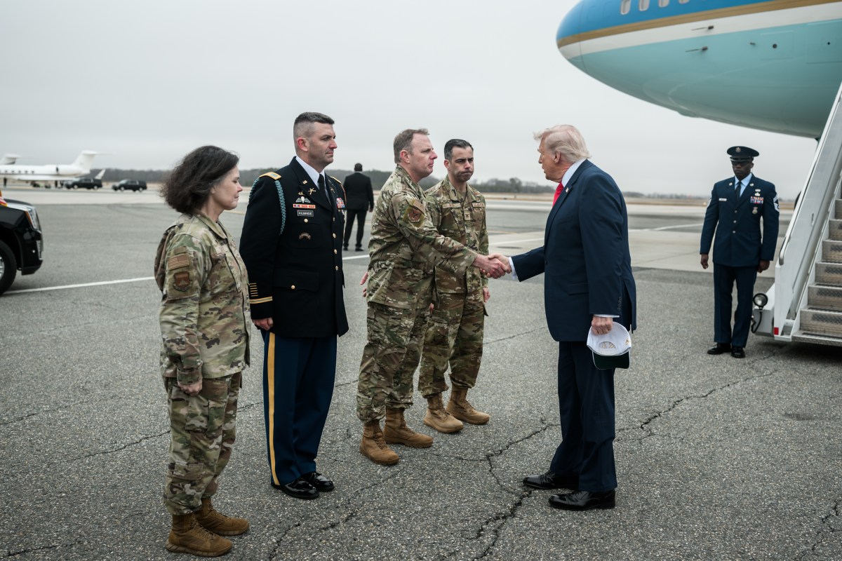 President Donald J. Trump greets 436th Airlift Wing Commander Col Jamil Musa and Col Martha Sasnett, Commander of Air Force Mortuary Affairs Operations at Dover Air Force Base, Delaware on Saturday, March 7, 2026. (Official White House Photo by Daniel Torok)