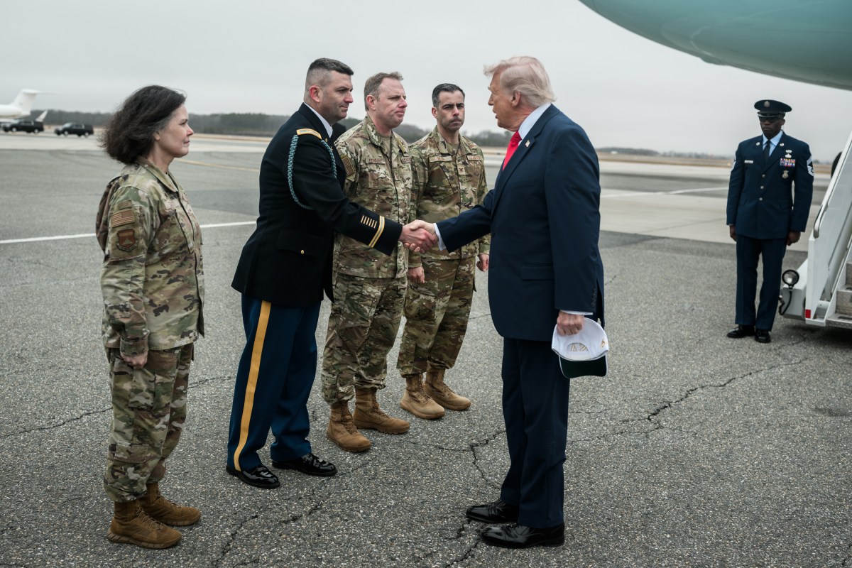 President Donald J. Trump greets 436th Airlift Wing Commander Col Jamil Musa and Col Martha Sasnett, Commander of Air Force Mortuary Affairs Operations at Dover Air Force Base, Delaware on Saturday, March 7, 2026. (Official White House Photo by Daniel Torok)