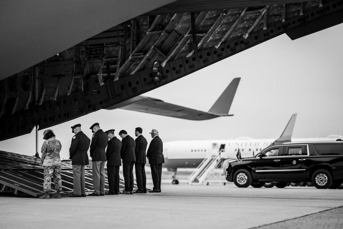 President Donald J. Trump and First Lady Melania Trump attend the Dignified Transfer of remains of six U.S. soldiers killed in an Iranian drone strike in Kuwait, Saturday, March 7, 2026, at Dover Air Force Base, Delaware. (Official White House Photo by Daniel Torok)