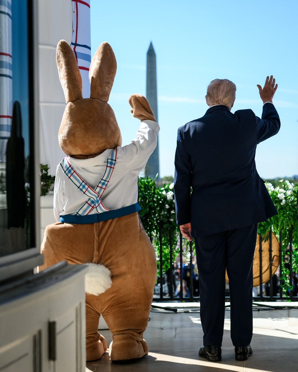 President Donald J. Trump and First Lady Melania Trump are accompanied by the Easter Bunny as they wave to the crowd from the Blue Room Balcony, Monday, April 6, 2026, during the annual White House Easter Egg Roll on the South Lawn. (Official White House Photo by Daniel Torok)