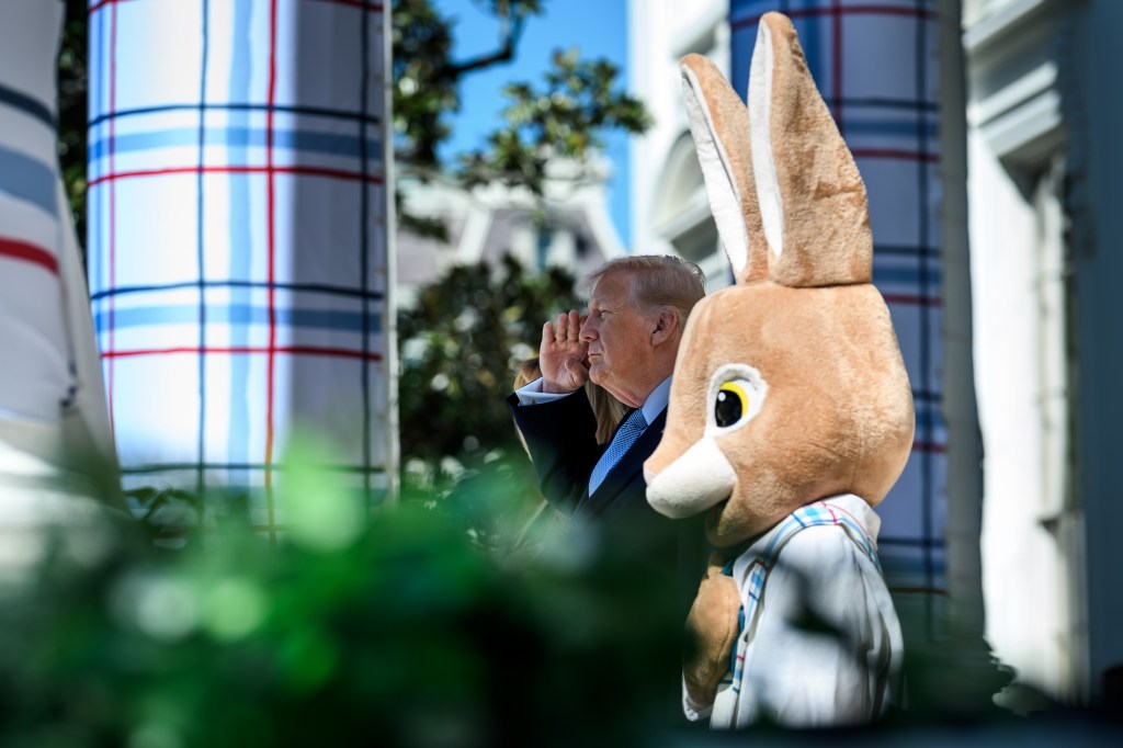 President Donald J. Trump and First Lady Melania Trump are accompanied by the Easter Bunny as they wave to the crowd from the Blue Room Balcony, Monday, April 6, 2026, during the annual White House Easter Egg Roll on the South Lawn. (Official White House Photo by Daniel Torok)