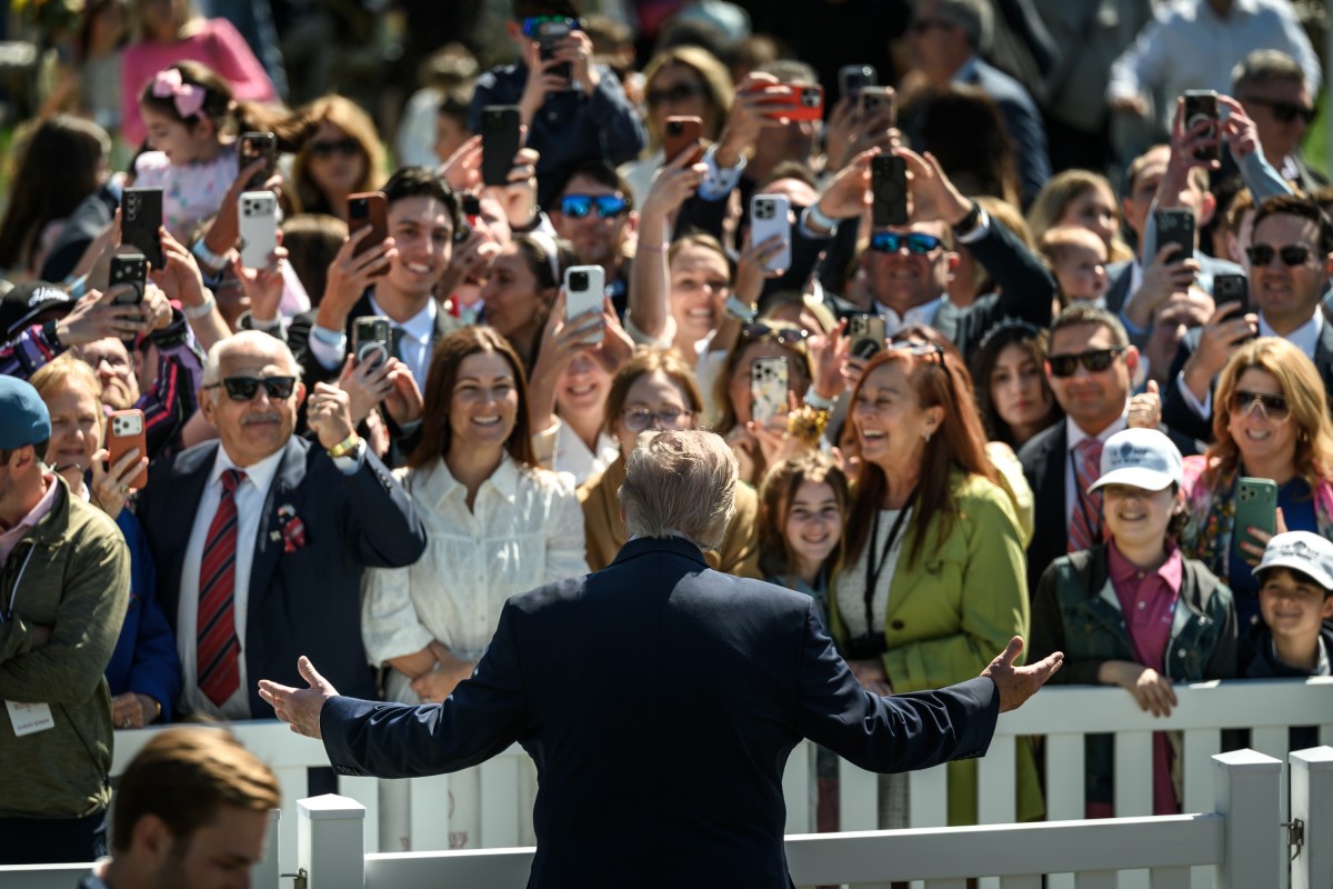 President Donald J. Trump and First Lady Melania Trump are accompanied by the Easter Bunny as they wave to the crowd from the Blue Room Balcony, Monday, April 6, 2026, during the annual White House Easter Egg Roll on the South Lawn. (Official White House Photo by Molly Riley)