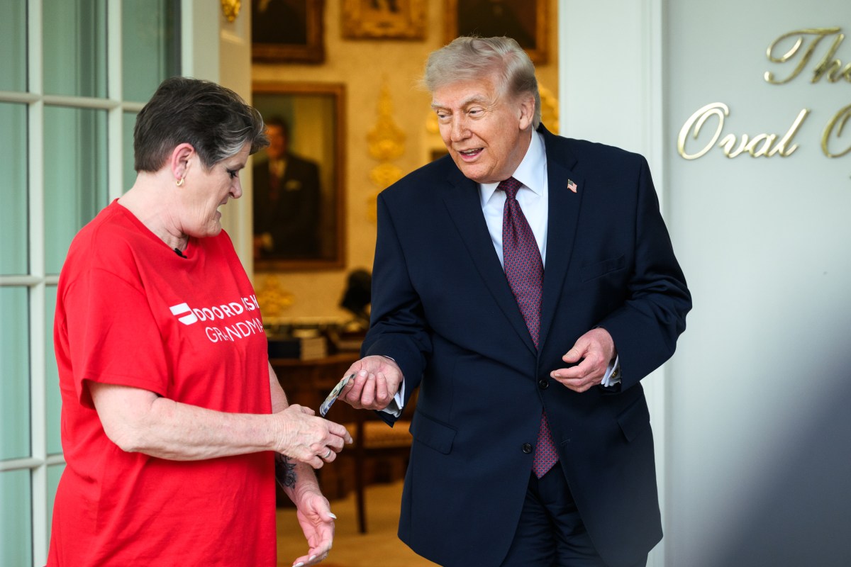 President Donald J. Trump speaks with members of the media after accepting a DoorDash delivery from Sharon Simmons outside of the Oval Office, Monday, April 13, 2026. (Official White House Photo by Daniel Torok)