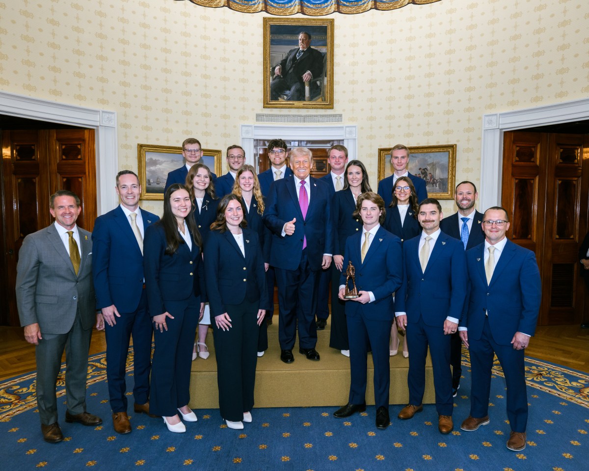 President Donald J. Trump poses with the West Virginia Mixed Rifle team in the Blue Room for NCAA Collegiate National Champions Day at the White House, Tuesday, April 21, 2026. (Official White House Photo by Daniel Torok)