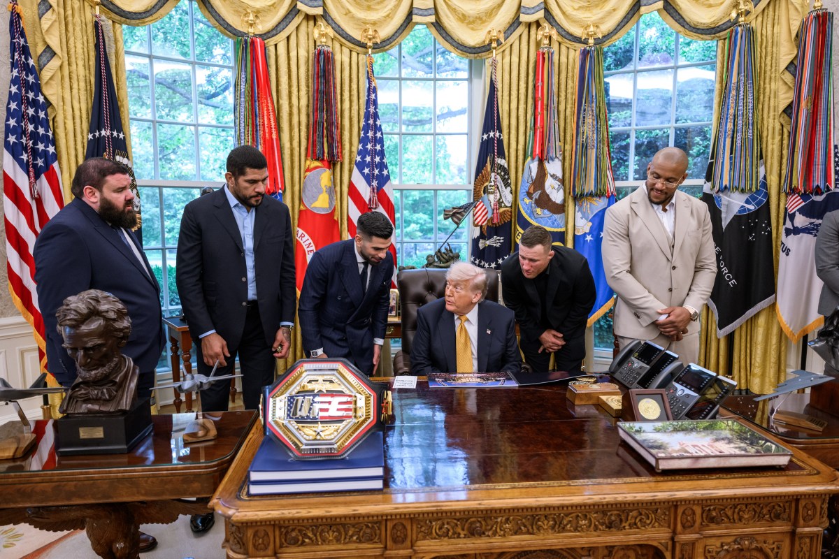 President Donald J. Trump speaks with members of the media alongside UFC fighters in the Oval Office, Wednesday, May 6, 2026. (Official White House Photo by Molly Riley)