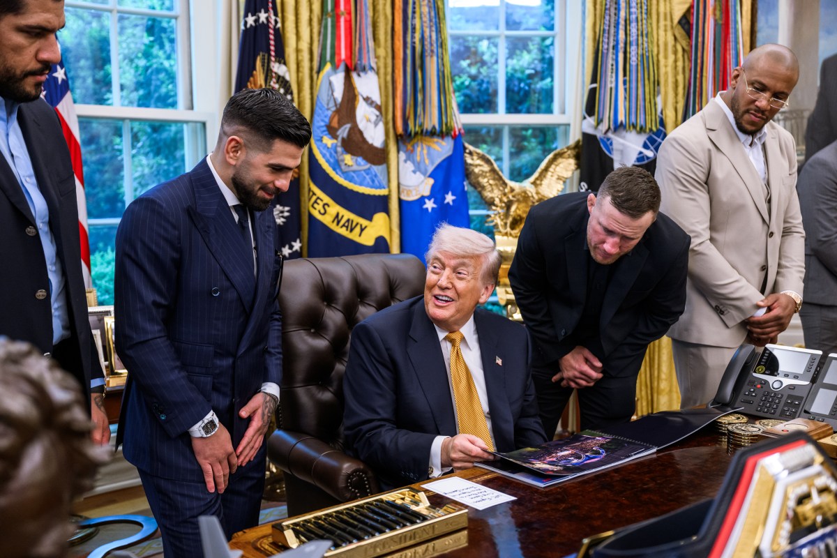President Donald J. Trump speaks with members of the media alongside UFC fighters in the Oval Office, Wednesday, May 6, 2026. (Official White House Photo by Molly Riley)