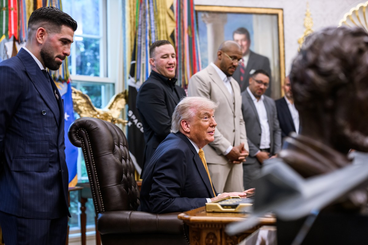 President Donald J. Trump speaks with members of the media alongside UFC fighters in the Oval Office, Wednesday, May 6, 2026. (Official White House Photo by Molly Riley)
