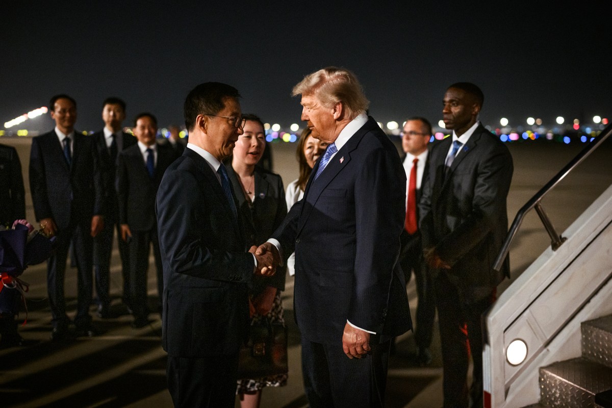President Donald J. Trump greets U.S. Ambassador to China David Perdue, his wife Bonnie Dunn, China’s Ambassador to the U.S. Xie Fang, and other Chinese officials during an arrival ceremony at Beijing International Airport, Wednesday, May 13, 2026. (Official White House Photo by Daniel Torok)