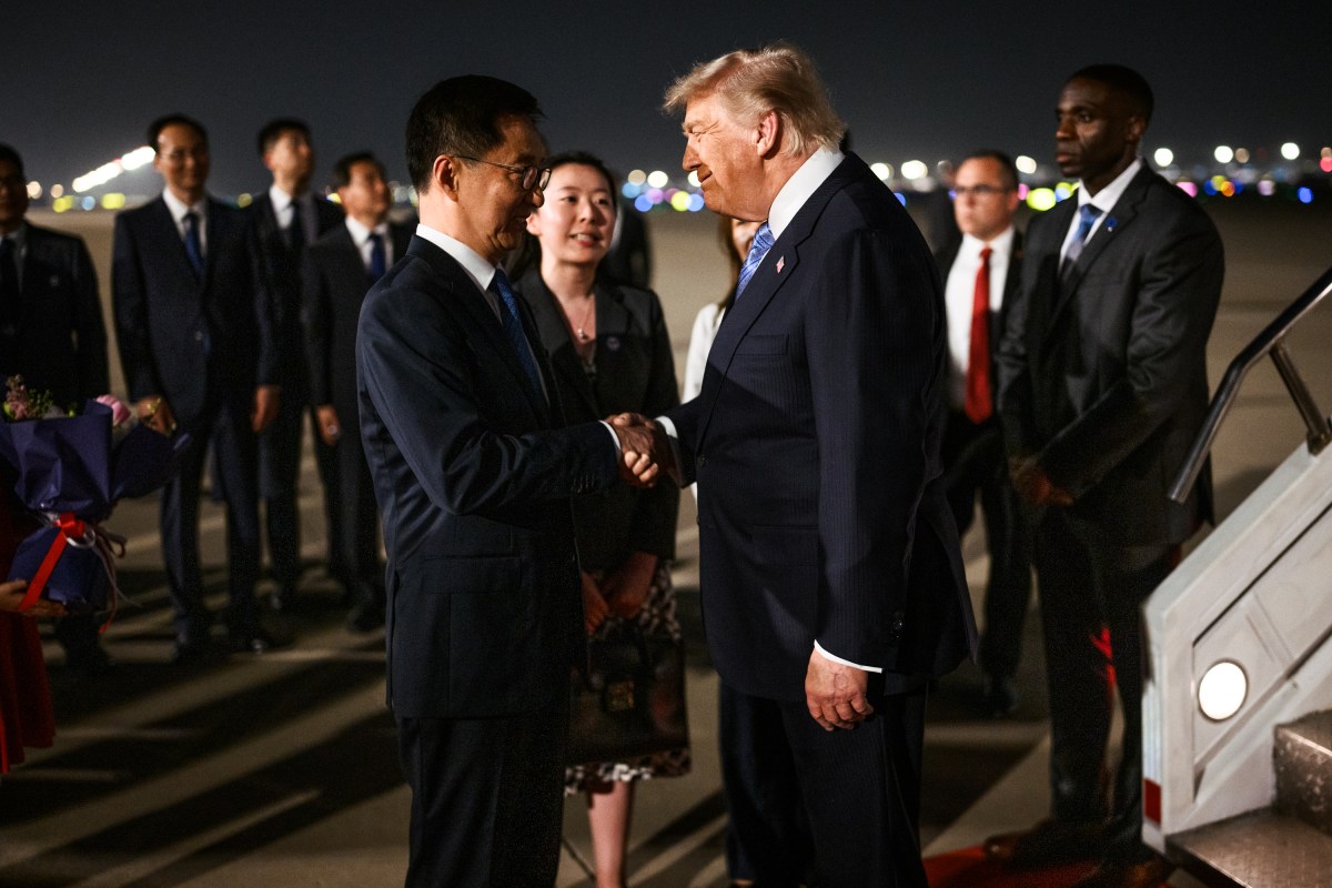 President Donald J. Trump greets U.S. Ambassador to China David Perdue, his wife Bonnie Dunn, China’s Ambassador to the U.S. Xie Fang, and other Chinese officials during an arrival ceremony at Beijing International Airport, Wednesday, May 13, 2026. (Official White House Photo by Daniel Torok)