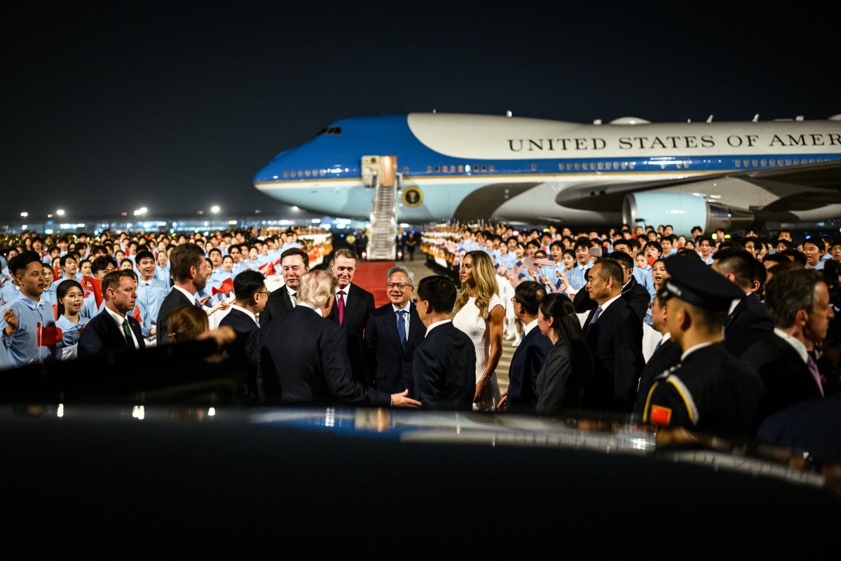 President Donald J. Trump introduces Chinese officials to business leaders from the tech industry, including Tesla CEO Elon Musk and Nvidia CEO Jensen Huang before boarding his motorcade at an arrival ceremony at Beijing International Airport, Wednesday, May 13, 2026.  (Official White House Photo by Daniel Torok)