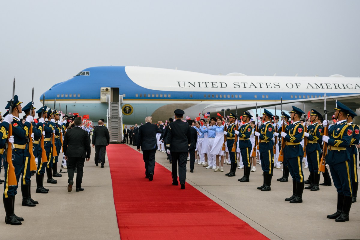 President Donald J. Trump greets Ambassadors David Perdue and Xie Feng, Executive Vice Minister of Foreign Affairs Ma Zhaoxu and Minister of Foreign Affairs Wang Yi at Beijing Capital International Airport, China on Friday, May 15, 2025, before boarding Air Force One en route Washington, D.C. (Official White House Photo by Daniel Torok)