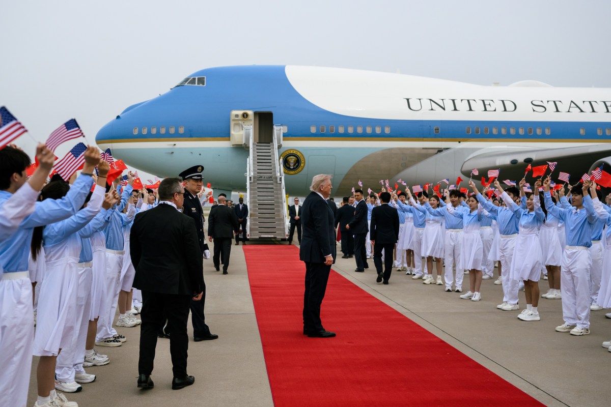 President Donald J. Trump greets Ambassadors David Perdue and Xie Feng, Executive Vice Minister of Foreign Affairs Ma Zhaoxu and Minister of Foreign Affairs Wang Yi at Beijing Capital International Airport, China on Friday, May 15, 2025, before boarding Air Force One en route Washington, D.C. (Official White House Photo by Daniel Torok)