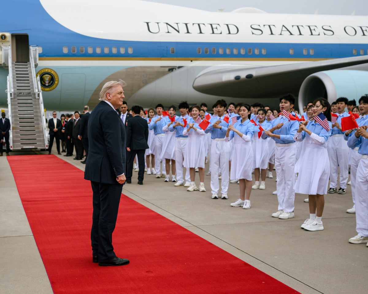 President Donald J. Trump greets Ambassadors David Perdue and Xie Feng, Executive Vice Minister of Foreign Affairs Ma Zhaoxu and Minister of Foreign Affairs Wang Yi at Beijing Capital International Airport, China on Friday, May 15, 2025, before boarding Air Force One en route Washington, D.C. (Official White House Photo by Daniel Torok)