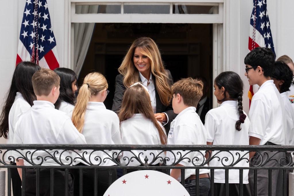 First Lady Melania Trump poses for a photo with student presenters at the Presidential Artificial Intelligence Challenge National Champion Awards, Tuesday, June 9, 2026, on the Blue Room Balcony of the White House.(Official White House Photo by Andrea Hanks)