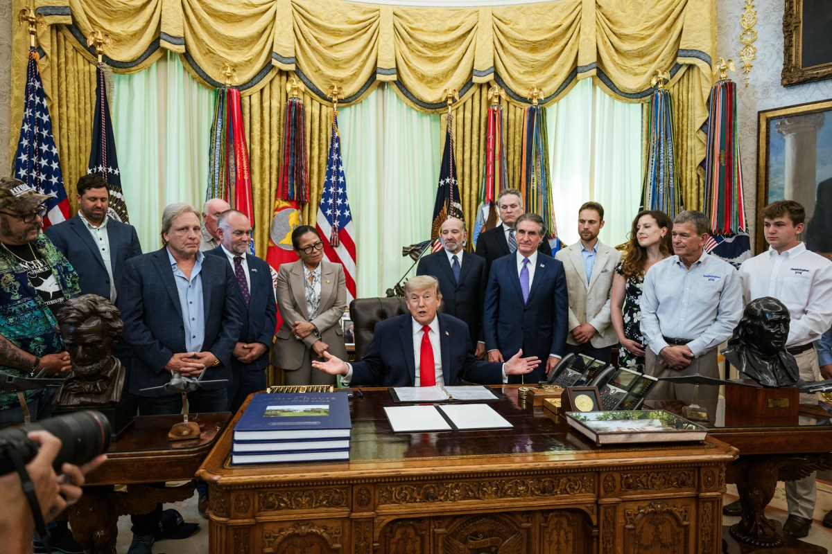 President Donald J. Trump signs a proclamation to restore commercial fishing access in the Pacific, advancing the America First Fishing Policy, Thursday, June 11, 2026, in the Oval Office. (Official White House Photo by Joyce N. Boghosian)