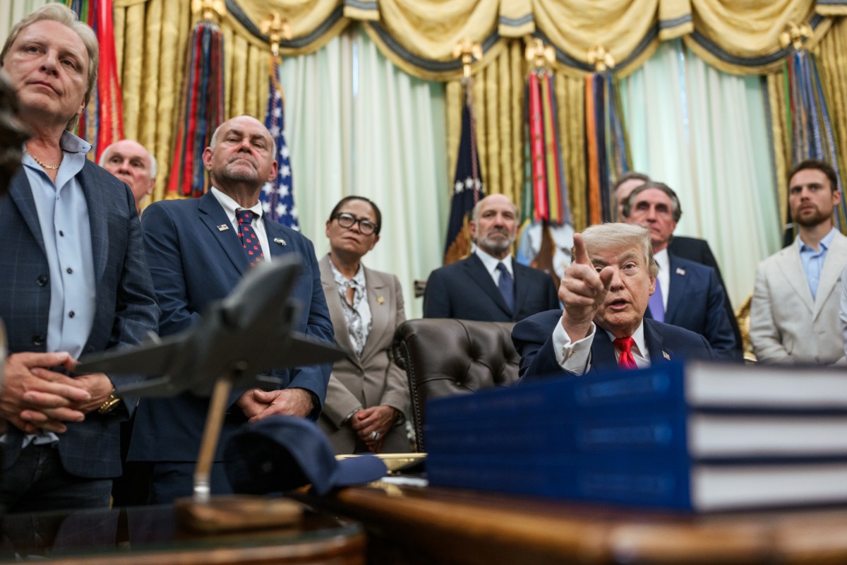 President Donald J. Trump signs a proclamation to restore commercial fishing access in the Pacific, advancing the America First Fishing Policy, Thursday, June 11, 2026, in the Oval Office. (Official White House Photo by Joyce N. Boghosian)