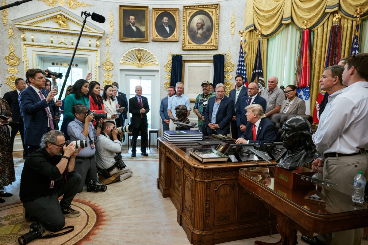 President Donald J. Trump signs a proclamation to restore commercial fishing access in the Pacific, advancing the America First Fishing Policy, Thursday, June 11, 2026, in the Oval Office. (Official White House Photo by Joyce N. Boghosian)
