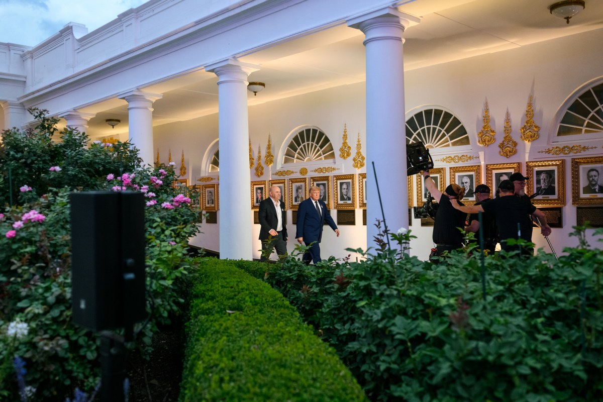 President Donald J. Trump and UFC CEO Dana White walk from the Oval Office to the UFC Freedom 250 Octagon on the South Lawn of the White House, Sunday, June 14, 2026. (Official White House Photo by Daniel Torok)