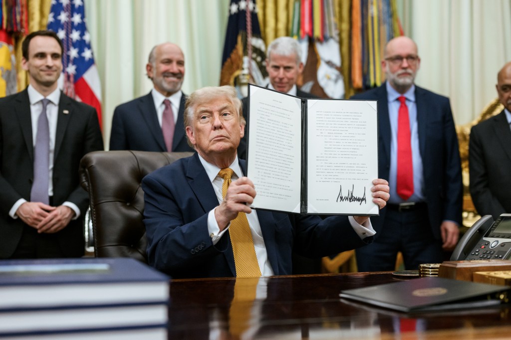 President Donald J. Trump, joined by Secretary of War Pete Hegseth, Physicist John M. Martinis, Science and Technology Policy Director Michael Kratsios, Secretary of Commerce Howard Lutnick, Secretary of Energy Chris Wright, OMB Director Russ Vought, and others, delivers remarks after signing an Executive Order on quantum computing in the Oval Office, Monday, June 22, 2026. (Official White House Photo by Joyce N. Boghosian)