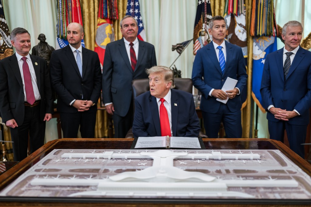 President Donald J. Trump makes an announcement regarding Dulles International Airport alongside Transportation Secretary Sean Duffy in the Oval Office, Wednesday, July 29, 2026. (Official White House Photo by Daniel Torok)